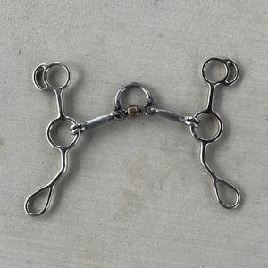 Gag Bit - 7” shank - port with roller